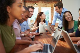 Businessmen And Businesswomen Meeting To Discuss Ideas